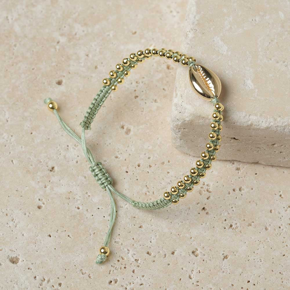 Bracciale intrecciato con conchiglia kauri oro verde giada