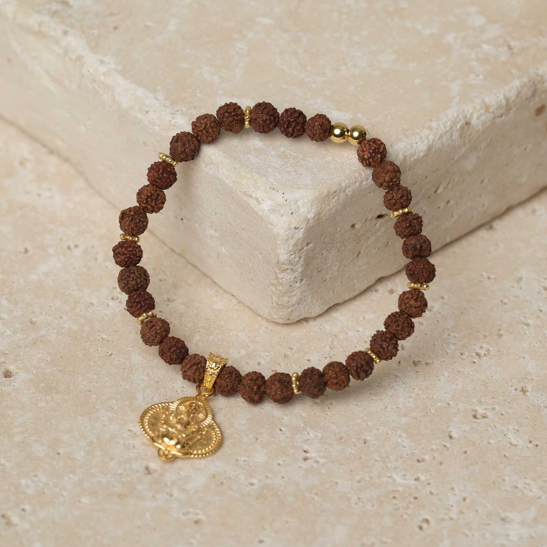 Bracciale Ganesh con perline Rudraksha oro