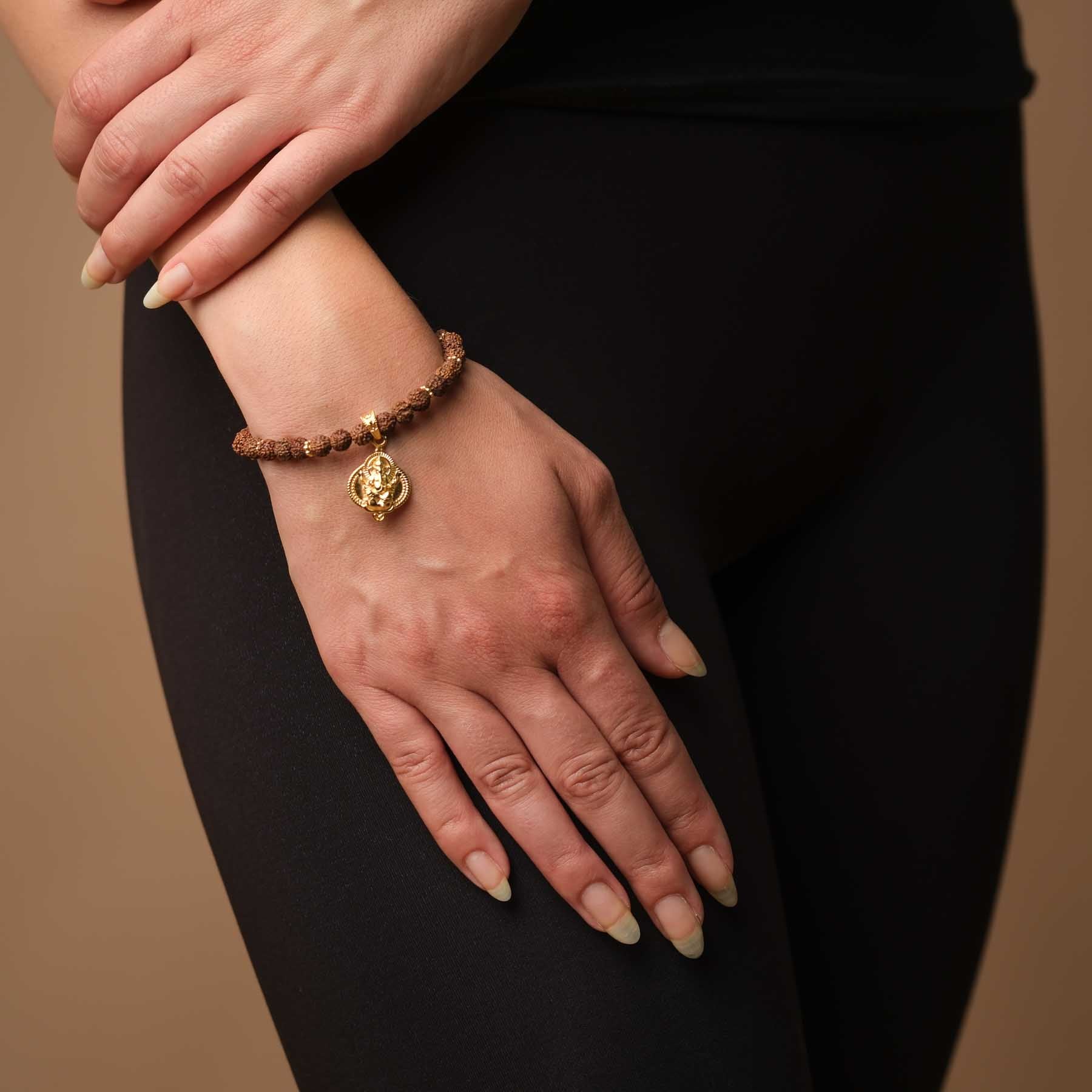 Bracciale Ganesh con perline Rudraksha oro