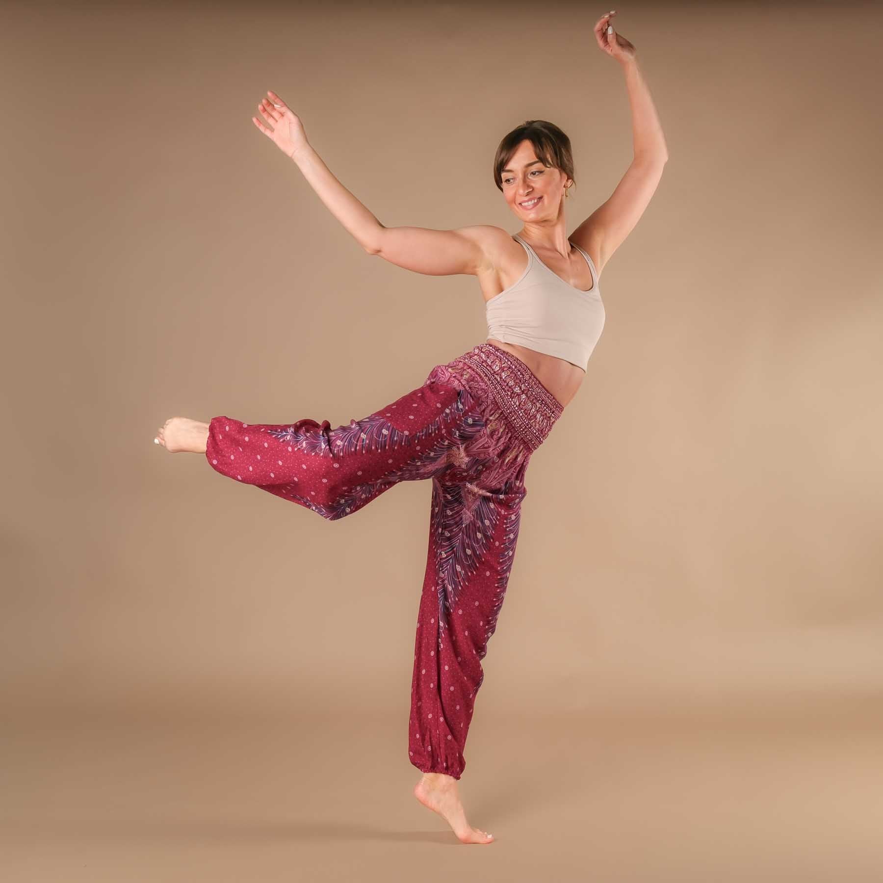 Pantaloni harem yoga rosso piuma