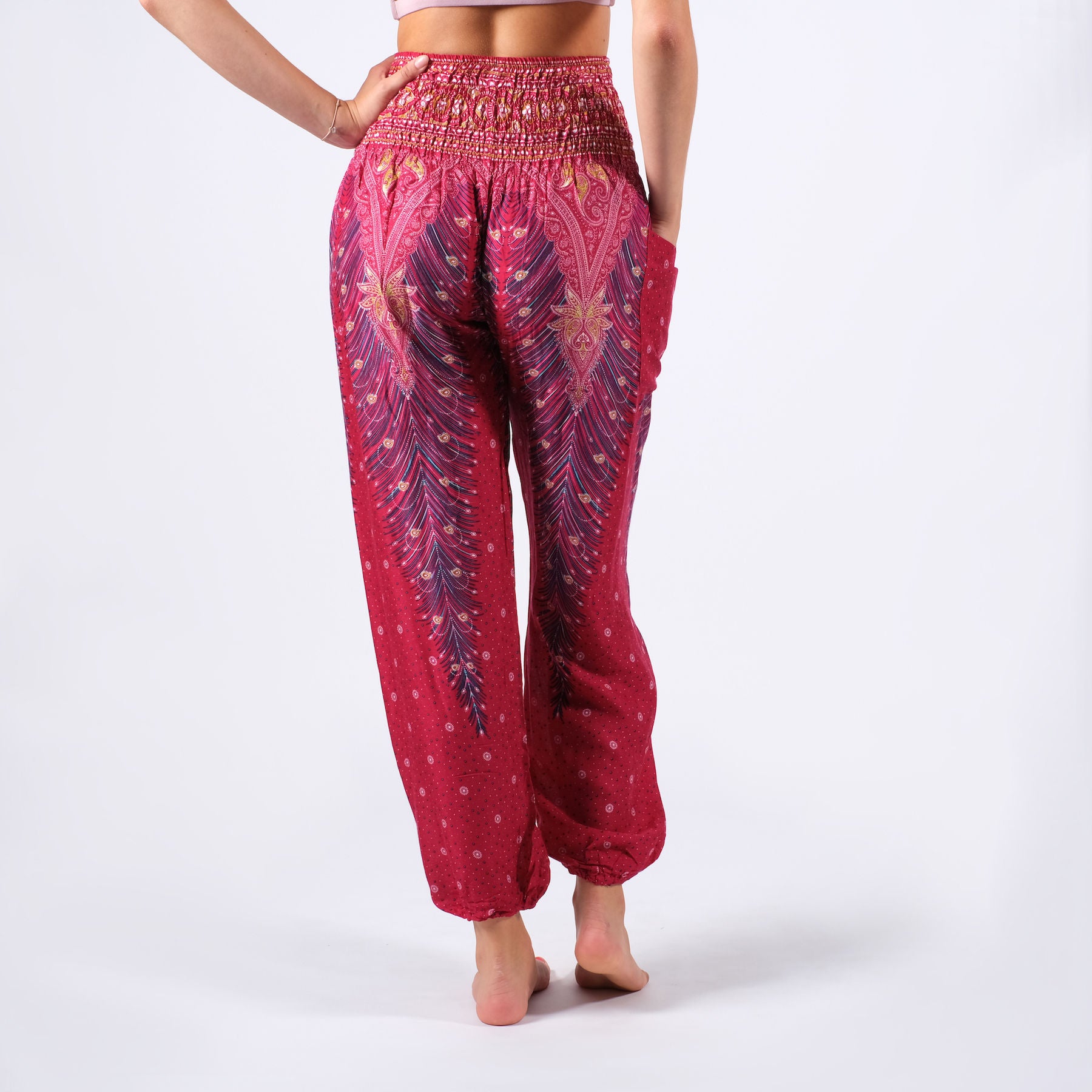 Pantaloni harem yoga rosso piuma