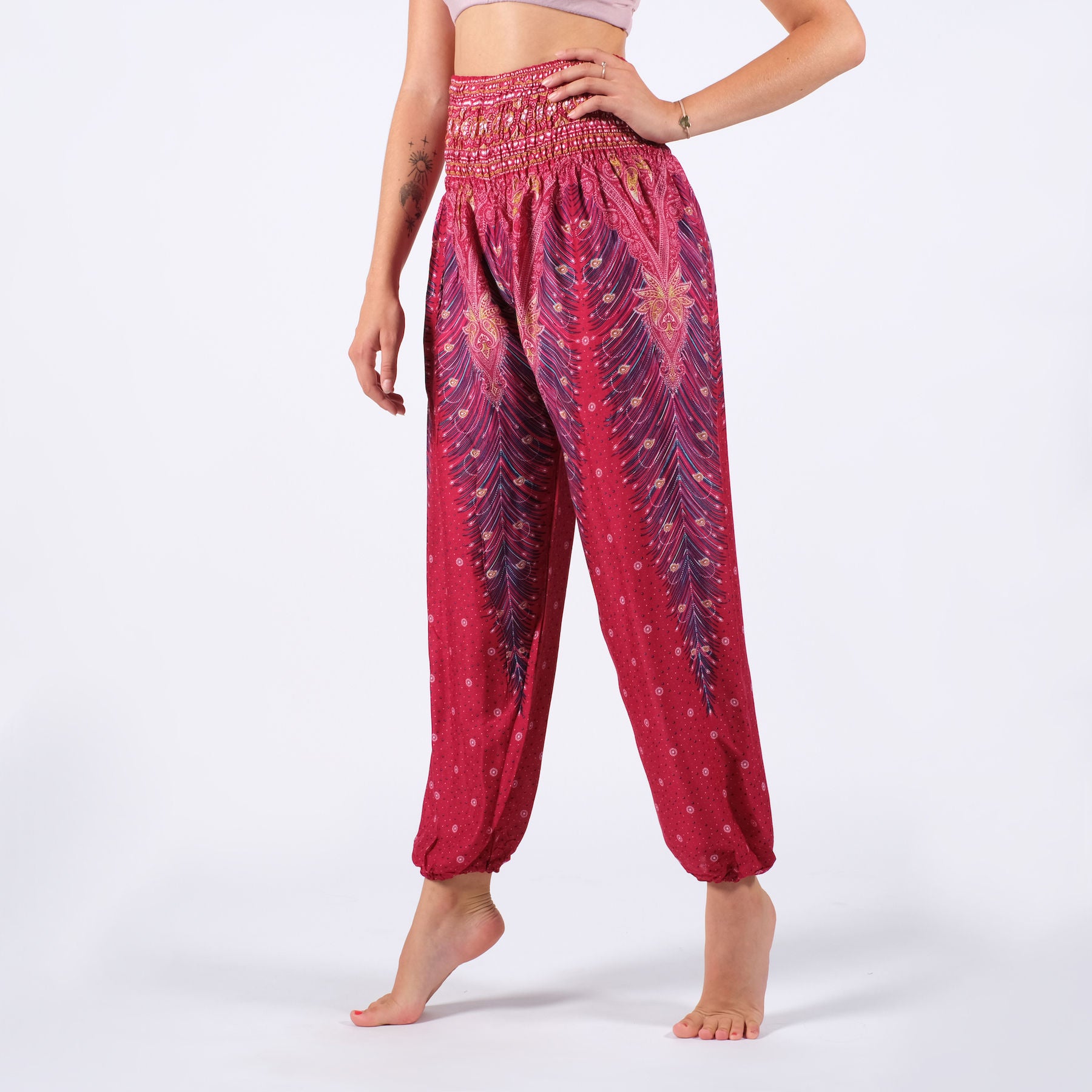 Pantaloni harem yoga rosso piuma