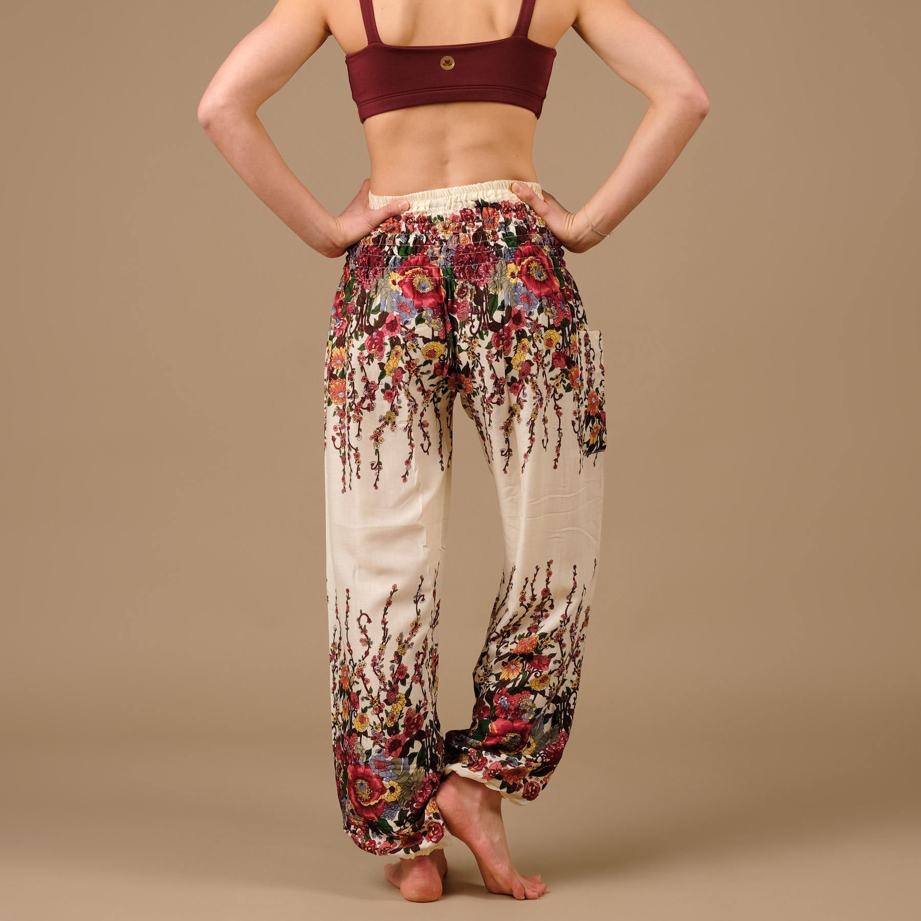 Pantaloni yoga harem bianco piuma